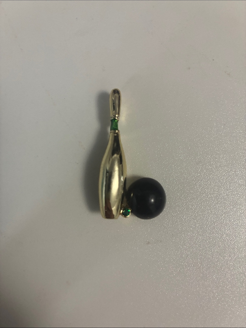 Vintage gold toned bowling pin and ball pin
